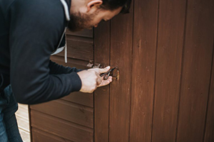 Guy locking the Tiger sheds