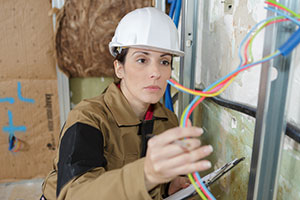 Female electrician being affected by the motherhood penalty