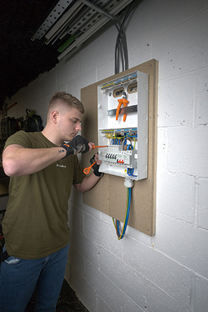 Electrician working on a Consumer Unit - Schneider Electric launch Easy9 Compact Multirow Consumer Unit 