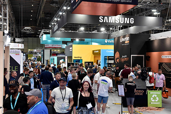 a number of people walking around between various different stands including a Samsung stand at the InstallerSHOW