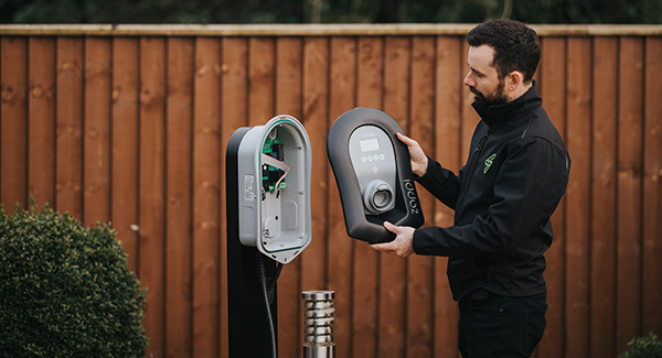 engineer installing solar-supporting technology