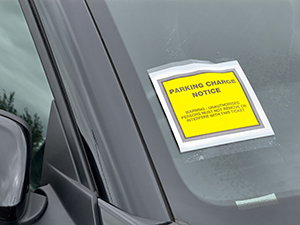 Parking charge notice on a van.